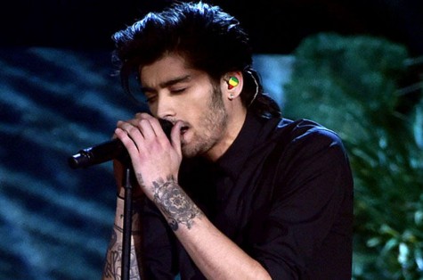 LOS ANGELES, CA - NOVEMBER 23: Recording artist Zayn Malik of One Direction performs onstage at the 2014 American Music Awards at Nokia Theatre L.A. Live on November 23, 2014 in Los Angeles, California. (Photo by Kevin Winter/Getty Images)